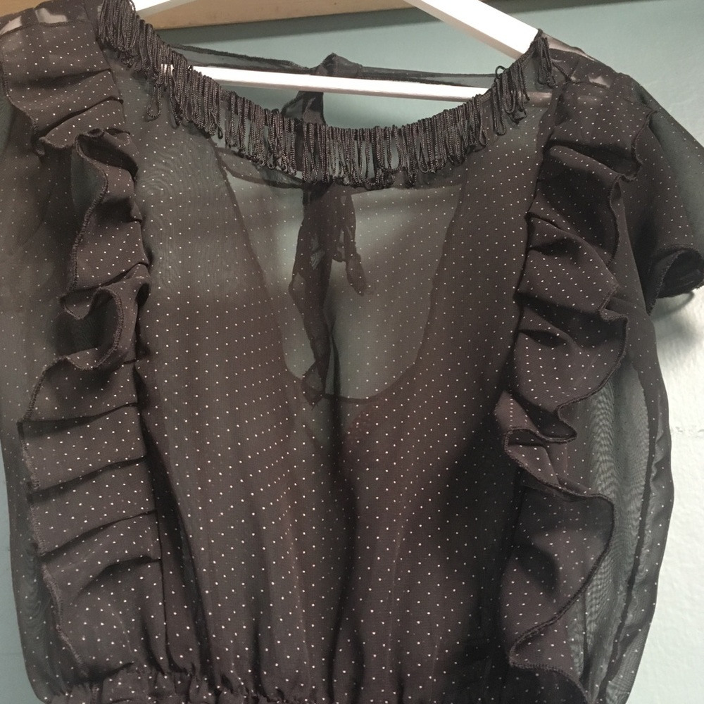 Vintage black dress with ruffle and fringe